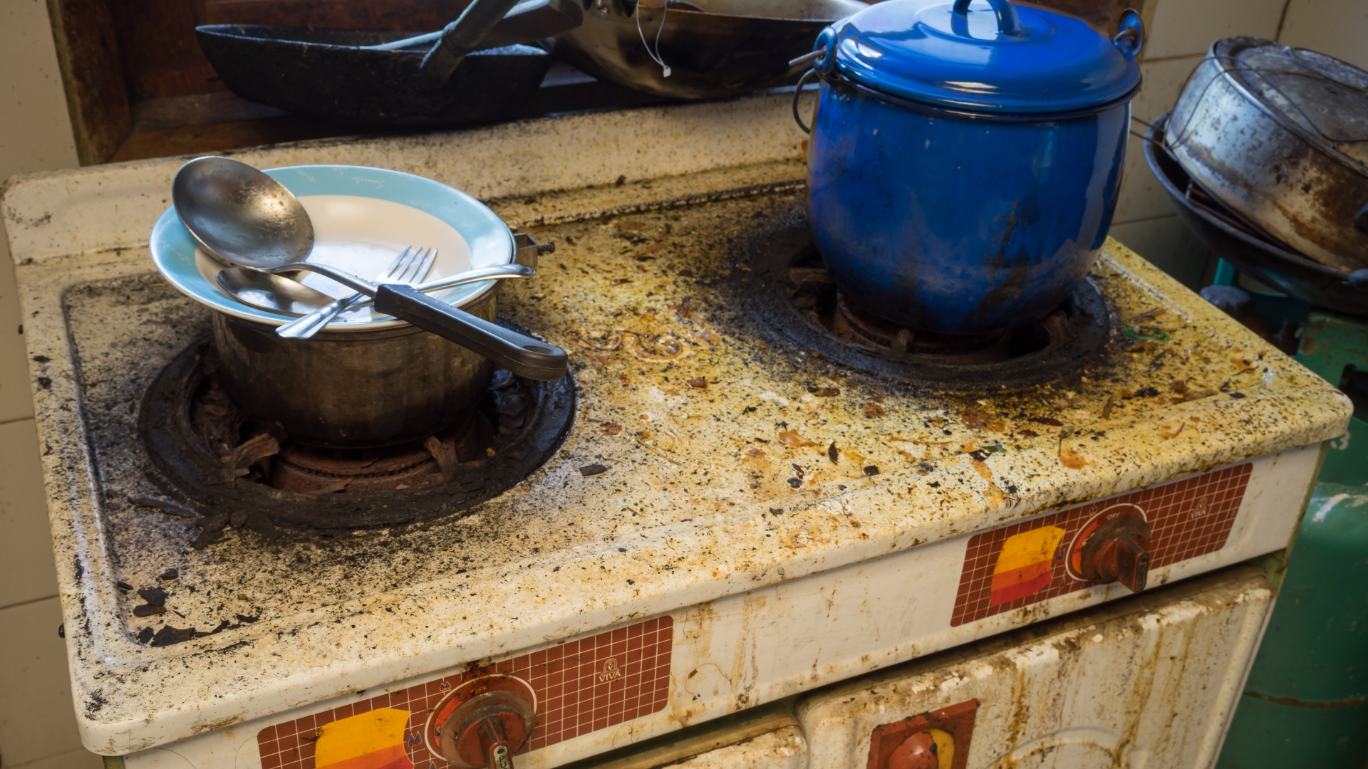 Dirty stove in a rental apartment