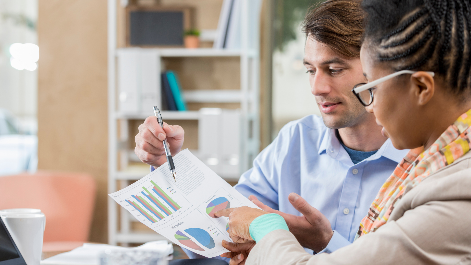 Property manager discussing with client during meeting