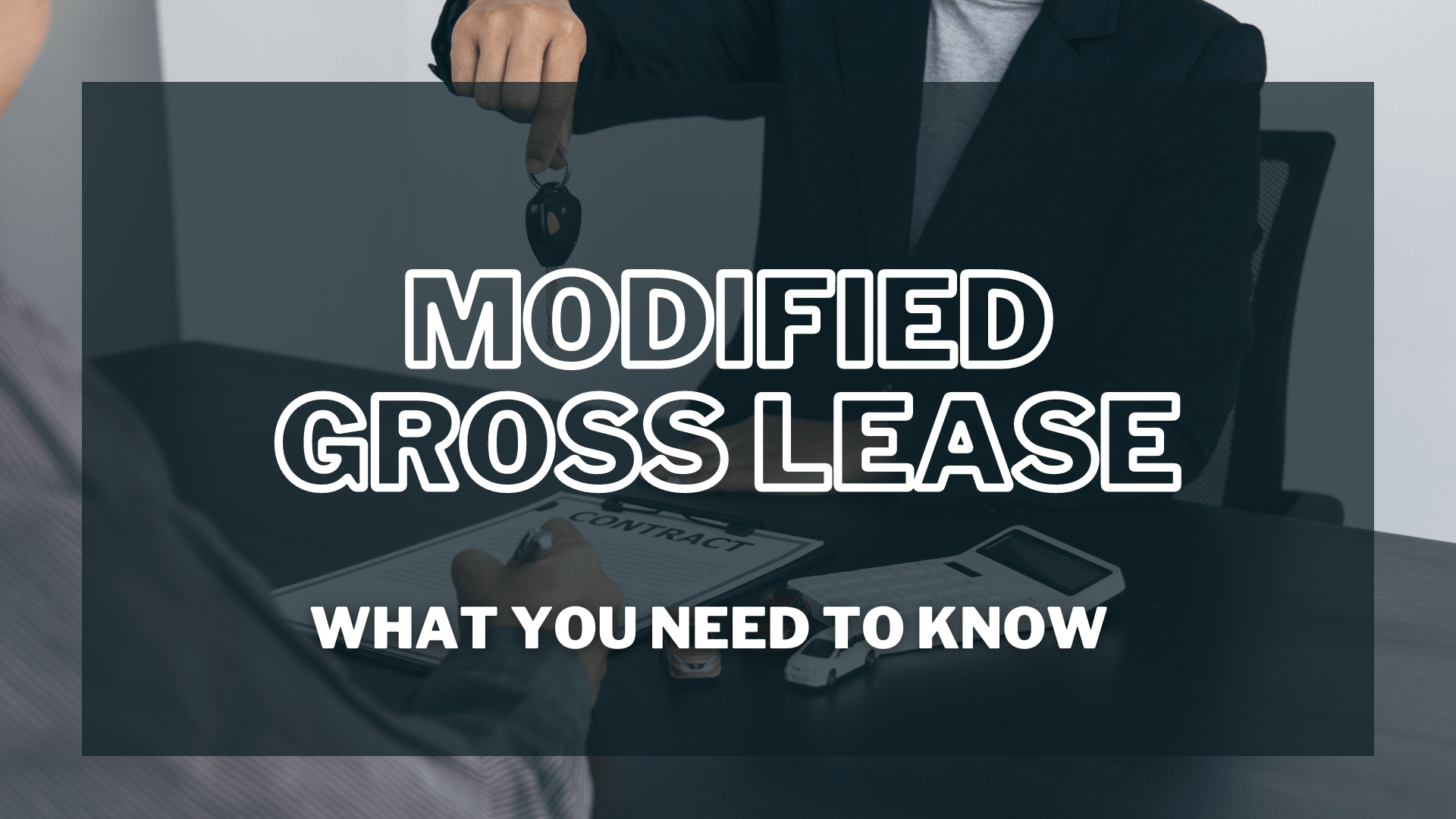 Person handing over keys to a leased commercial property.