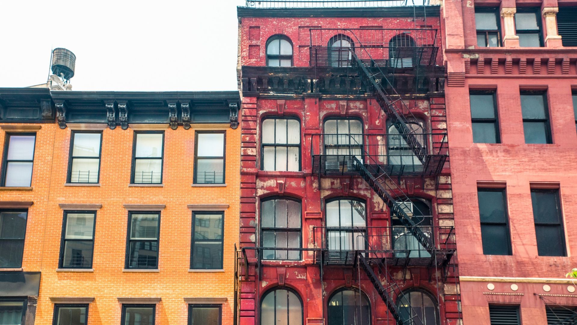 Several colorful rental buildings in the city
