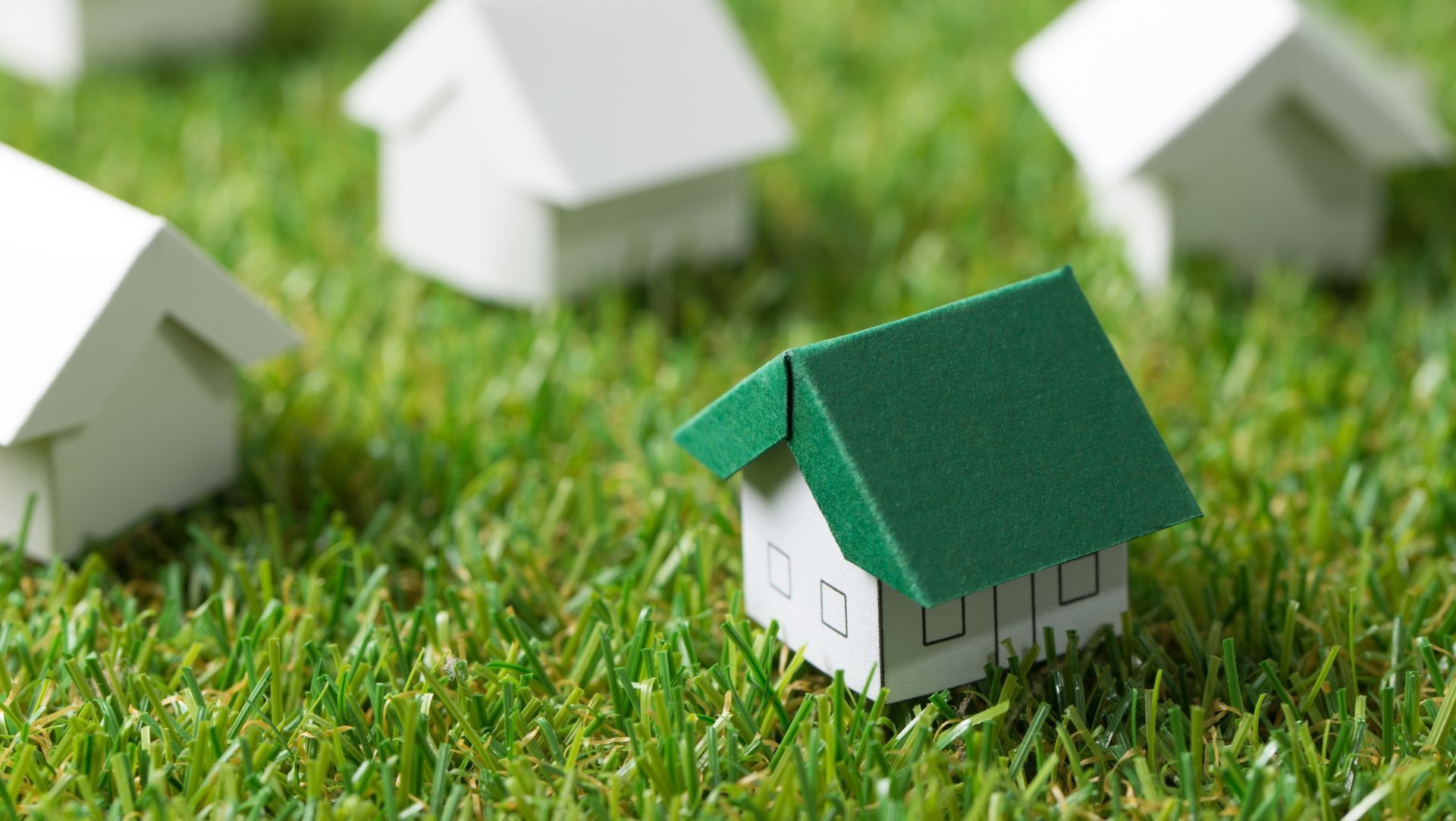 Small rental home on a lawn