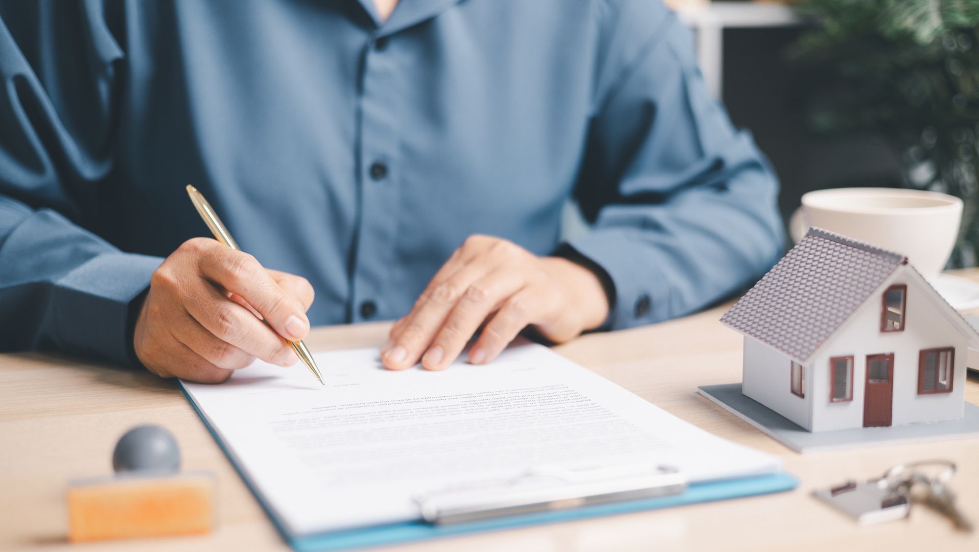 Tenant reviewing a rental lease agreement in Redding CA - Authority Property Management