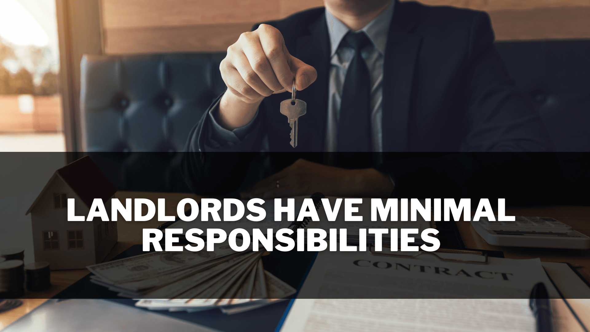Landlord or property owner passing keys to a tenant for a rental property.