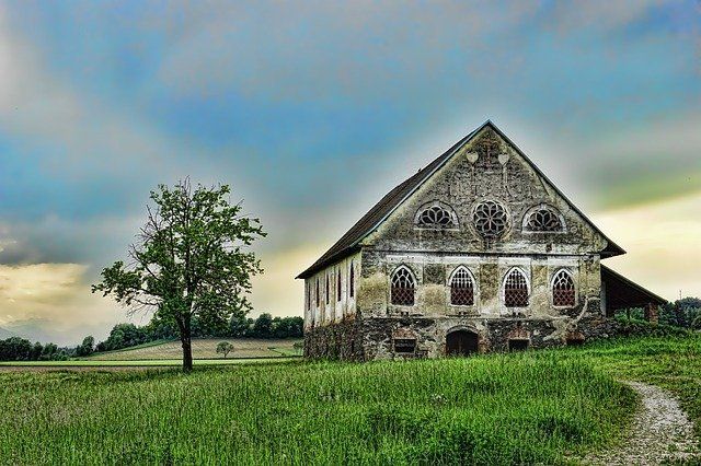 Older rental home in a field