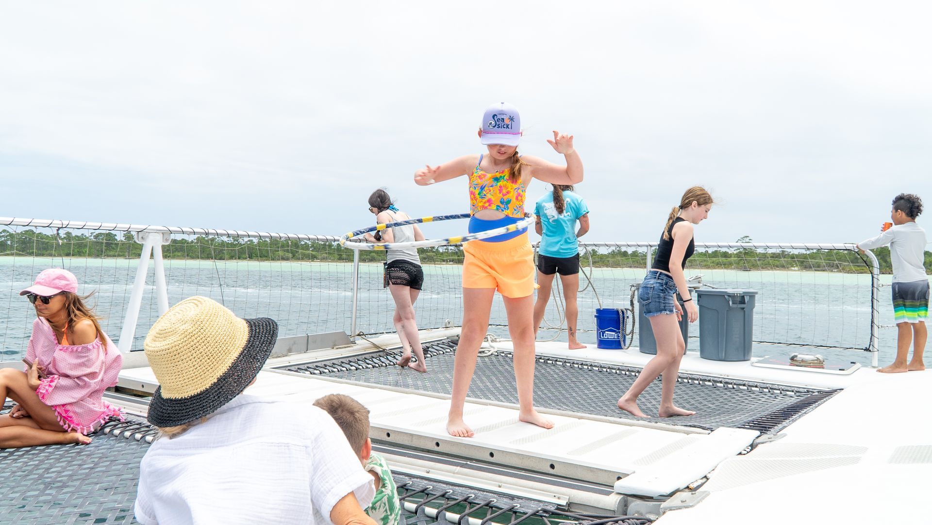 Kids playing on Dolphin cruise Destin