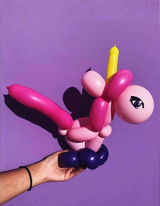 Pink balloon unicorn made by an Art2Entertain balloon twister