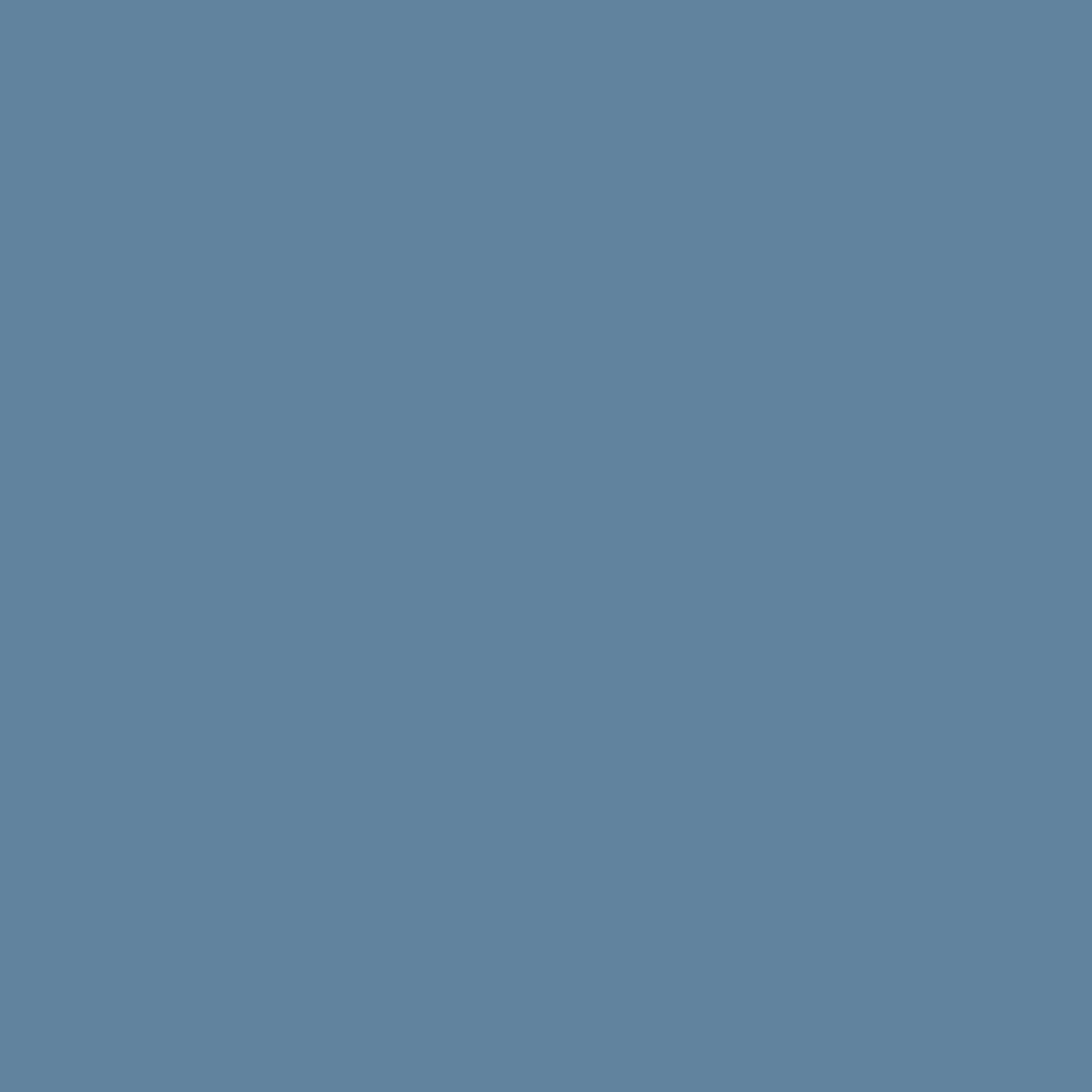 Solid muted blue-gray background.