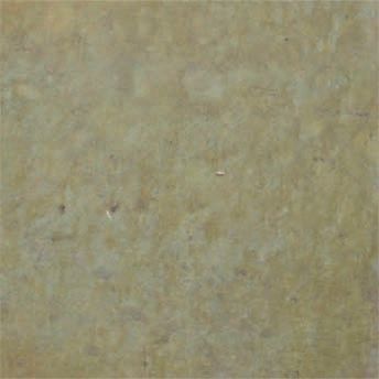 Close-up of a beige textured surface with subtle mottled patterns