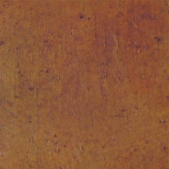 Rusty brown textured surface with small dark specks
