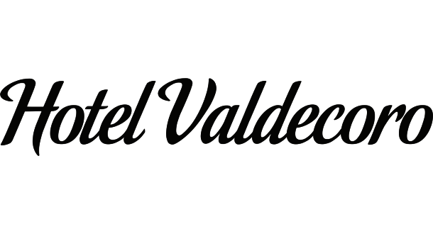 Hotel Valdecoro logo in cursive black text.