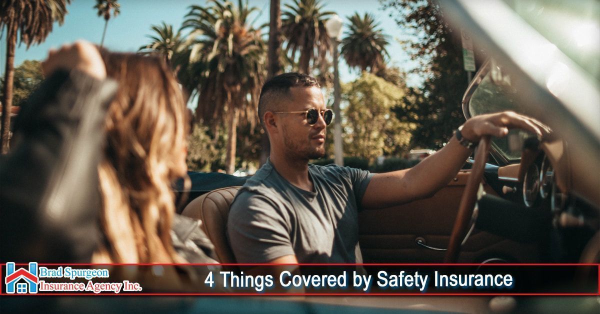 A man driving a convertible with a passenger