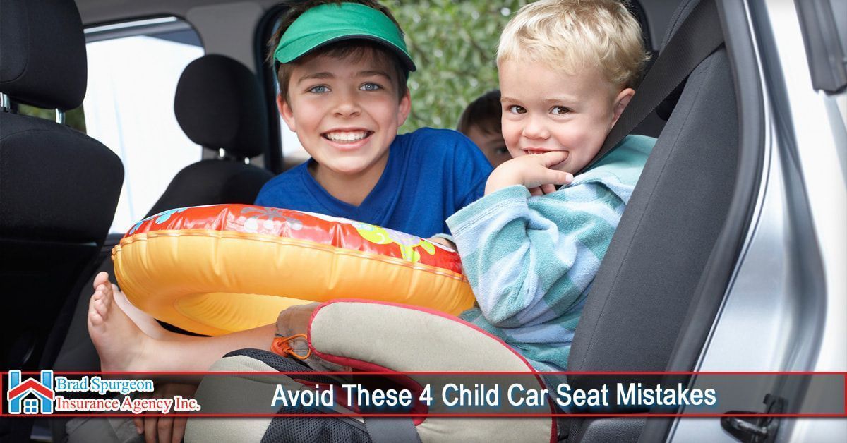 Two children sit in the back of a car; one holds an inflatable ring.
