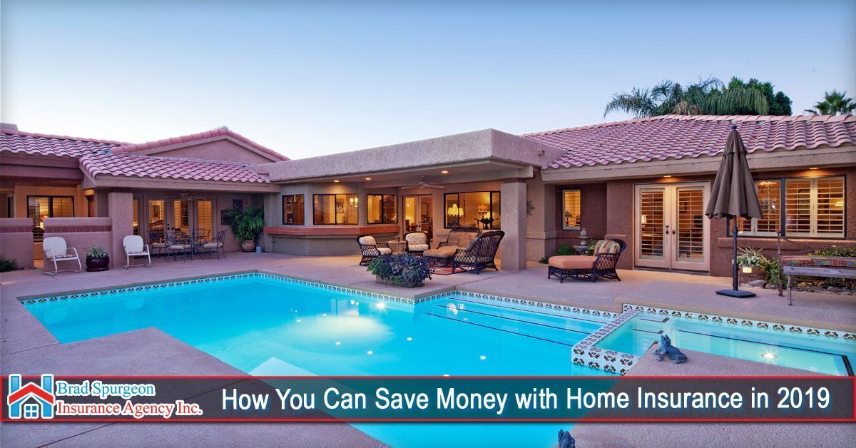 A luxurious house with a pool and patio area
