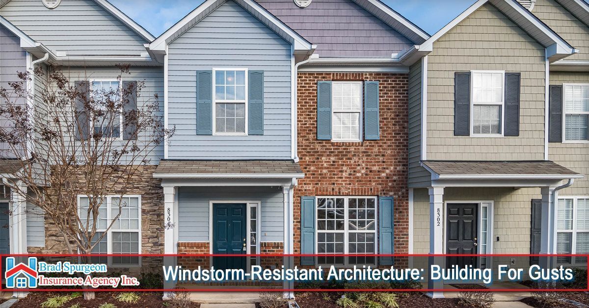 A row of townhouses with varying siding and brick exteriors