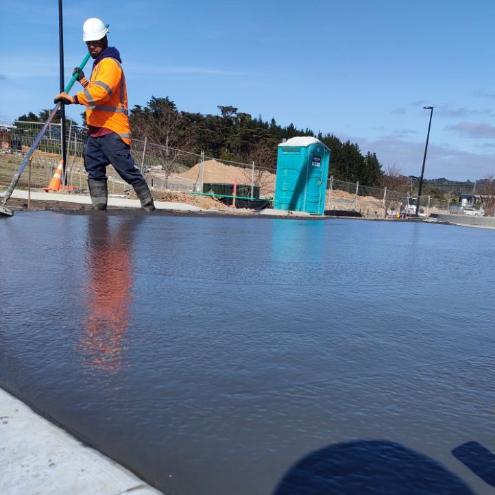 Skimming a freshly laid concrete surface