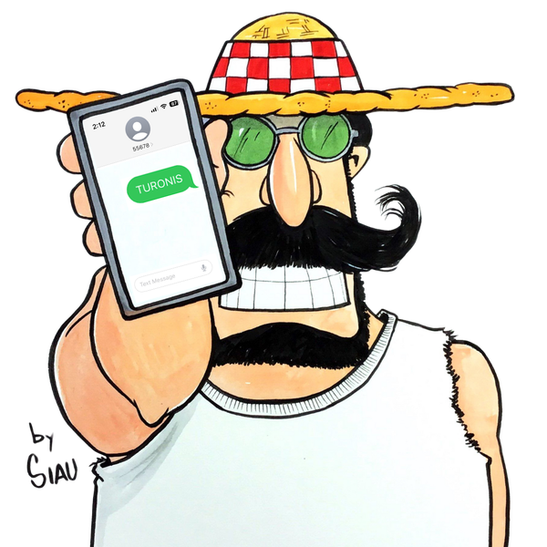 Vinny holding a cell phone