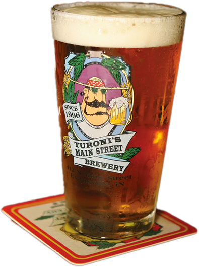 A glass of beer from turoni 's main street brewery sits on a coaster