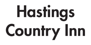 A black and white logo for hastings country inn