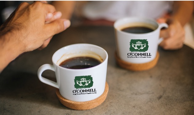 Two cups of coffee with the words occonnell on them