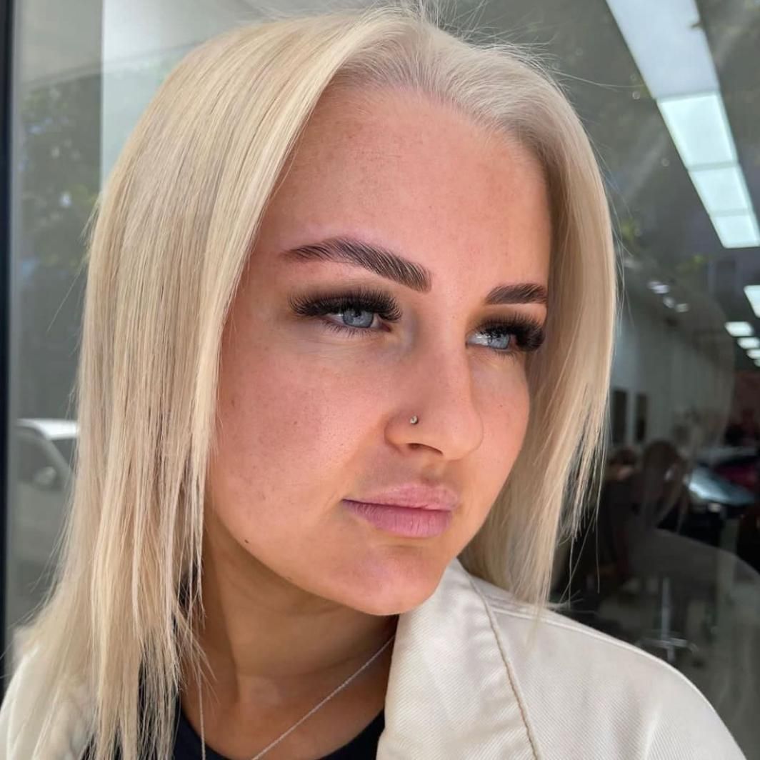 A Woman's Face With Blonde Hair And A Nose Ring — It's All About Brows In Varsity Lakes, QLD
