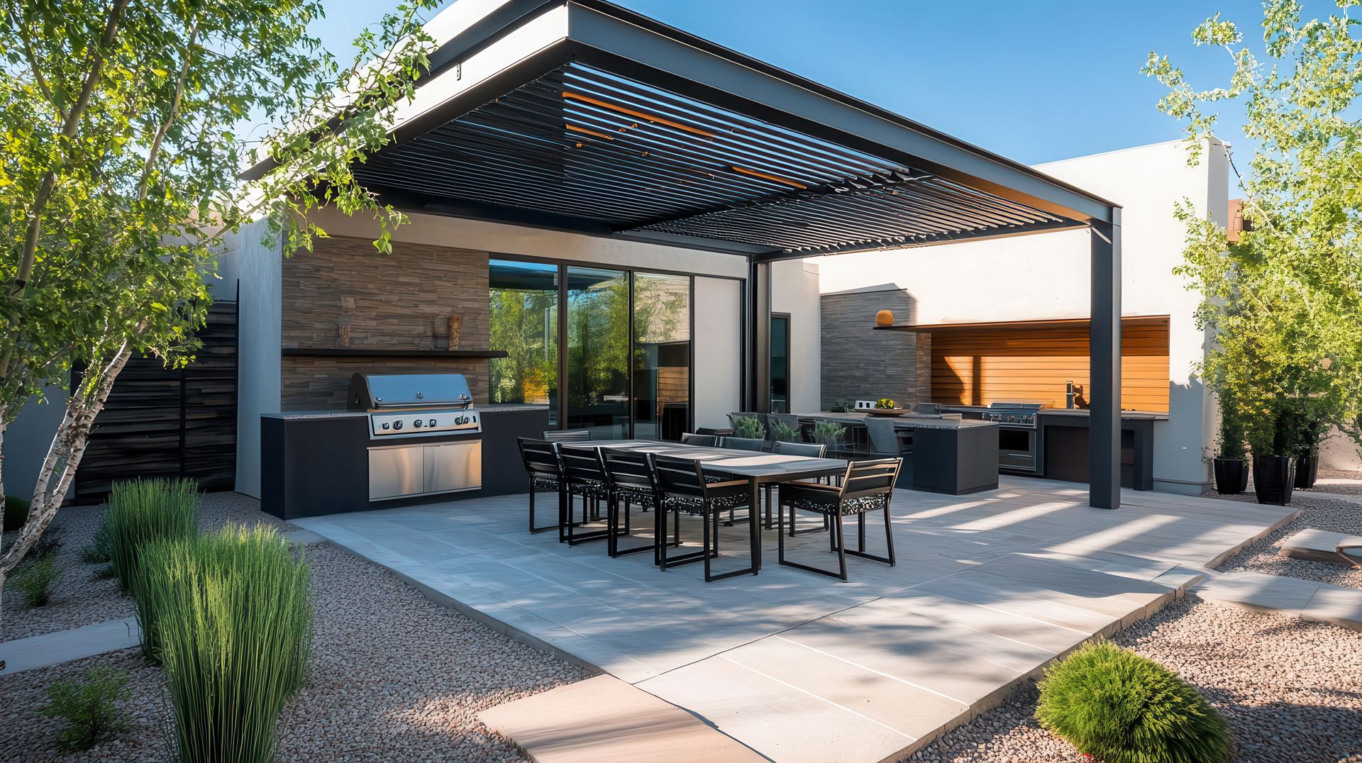 A patio with a table and chairs under a pergola.