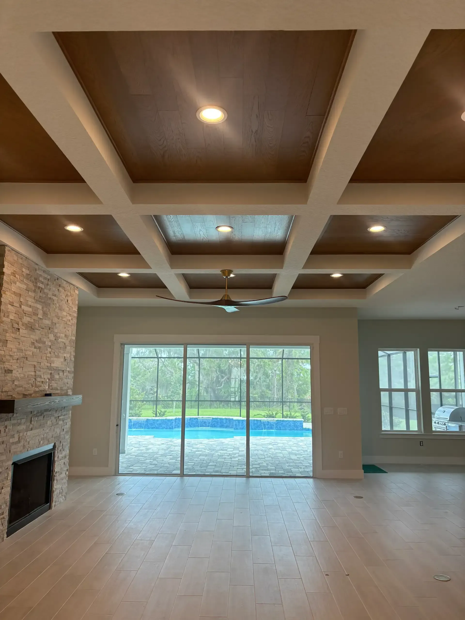 Square coffered tongue-and-groove wood ceiling