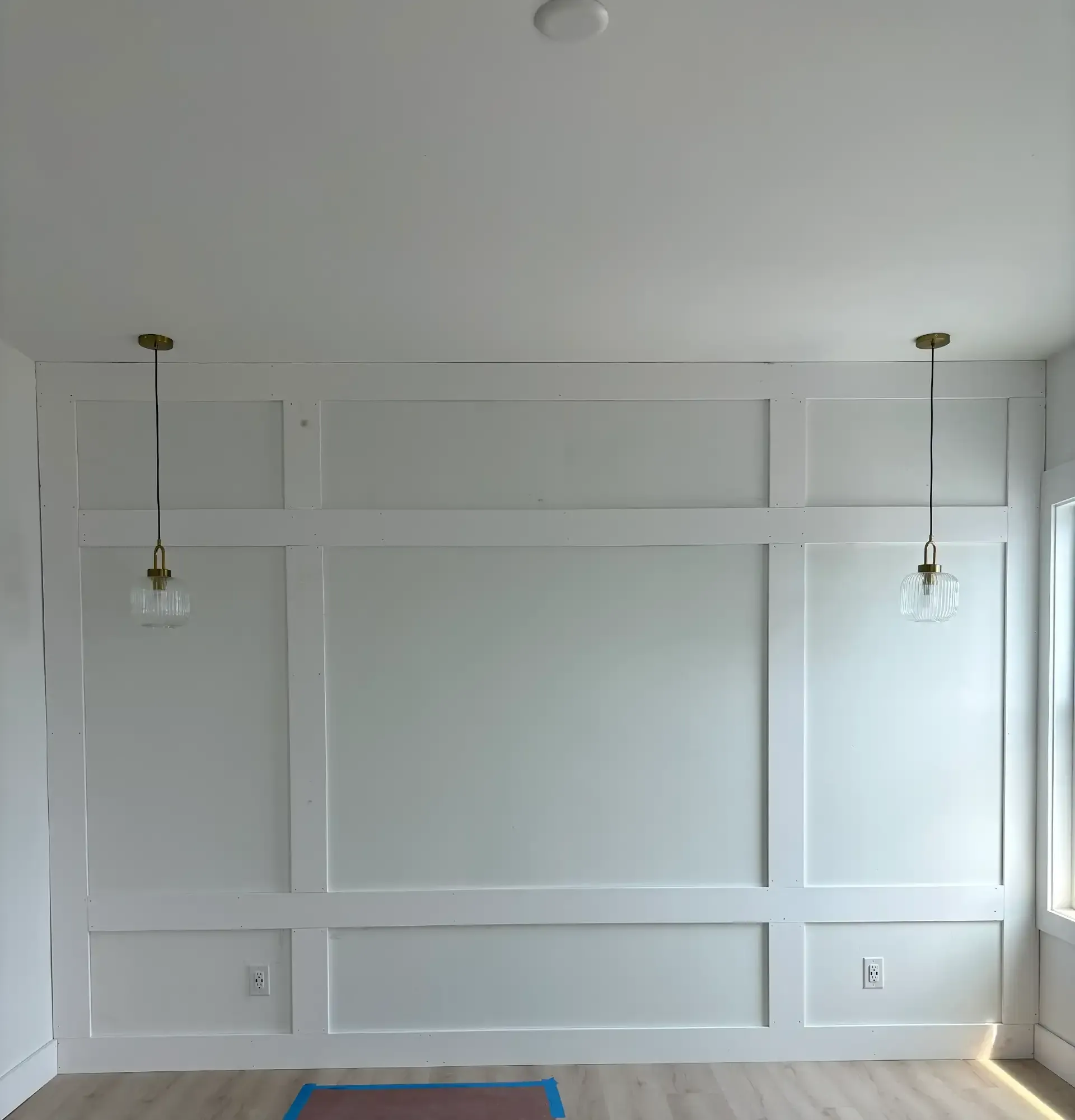 Simple grid accent wall with white trim panels