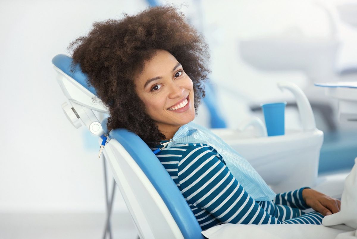 Woman Having Dental Treatment — Perry County, MS — New Augusta Dental Clinic Woman Having Dental Treatment — Perry County, MS — New Augusta Dental Clinic