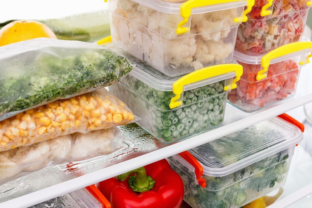 Freezer Filled With Clear Containers — Ace Fridge Door Seals In Cairns, QLD