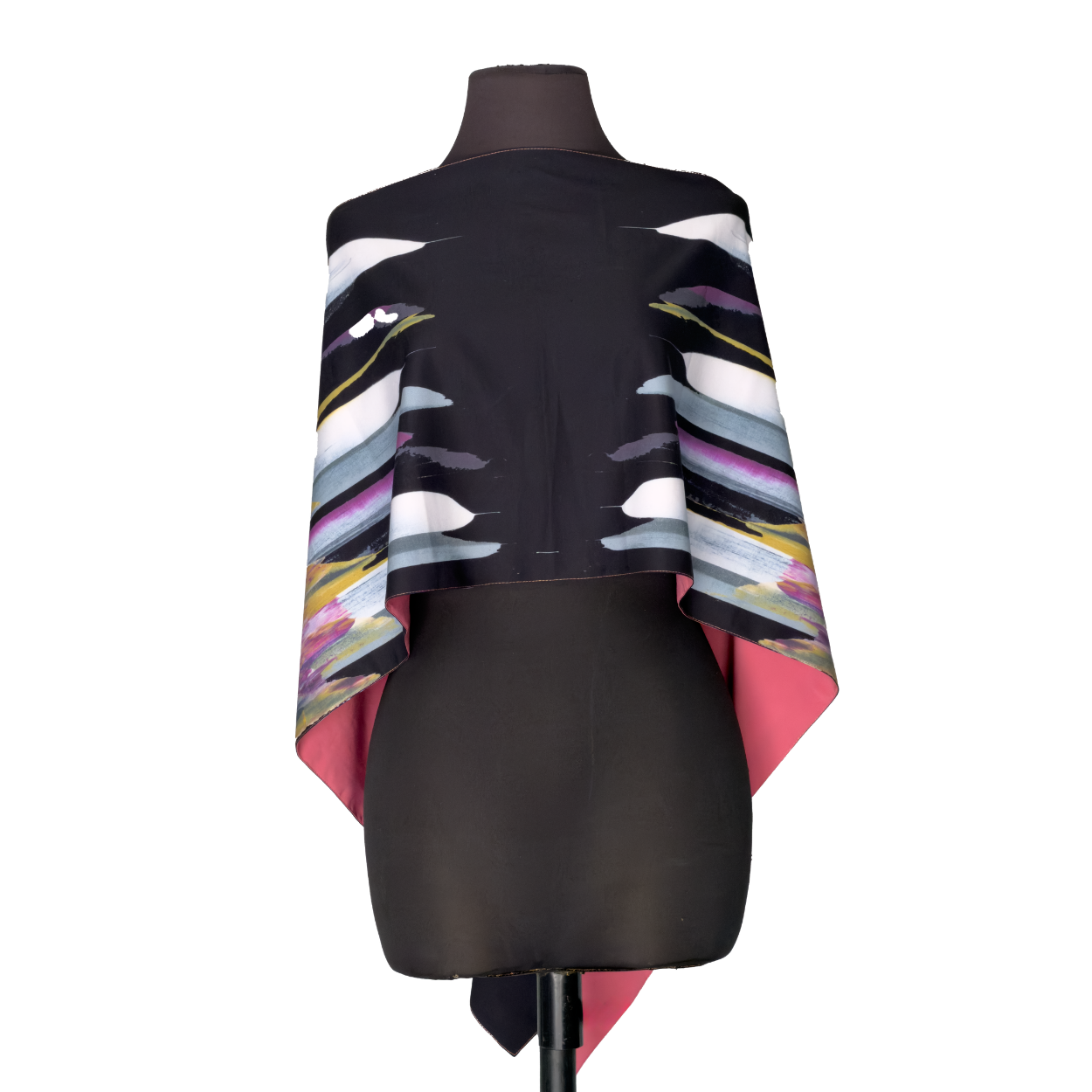 Black fashion garment with colorful striped draped sleeves on a mannequin