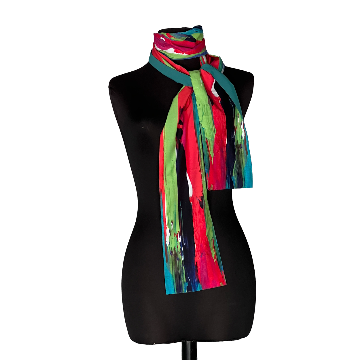 Colorful striped scarf draped around a black mannequin torso on a white background