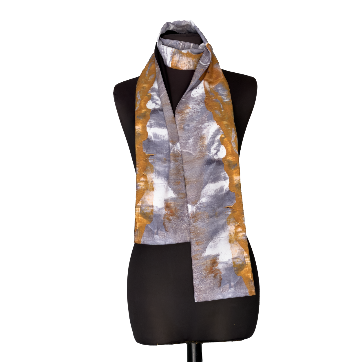 Silver and orange patterned scarf draped over a black dress form mannequin on a white background