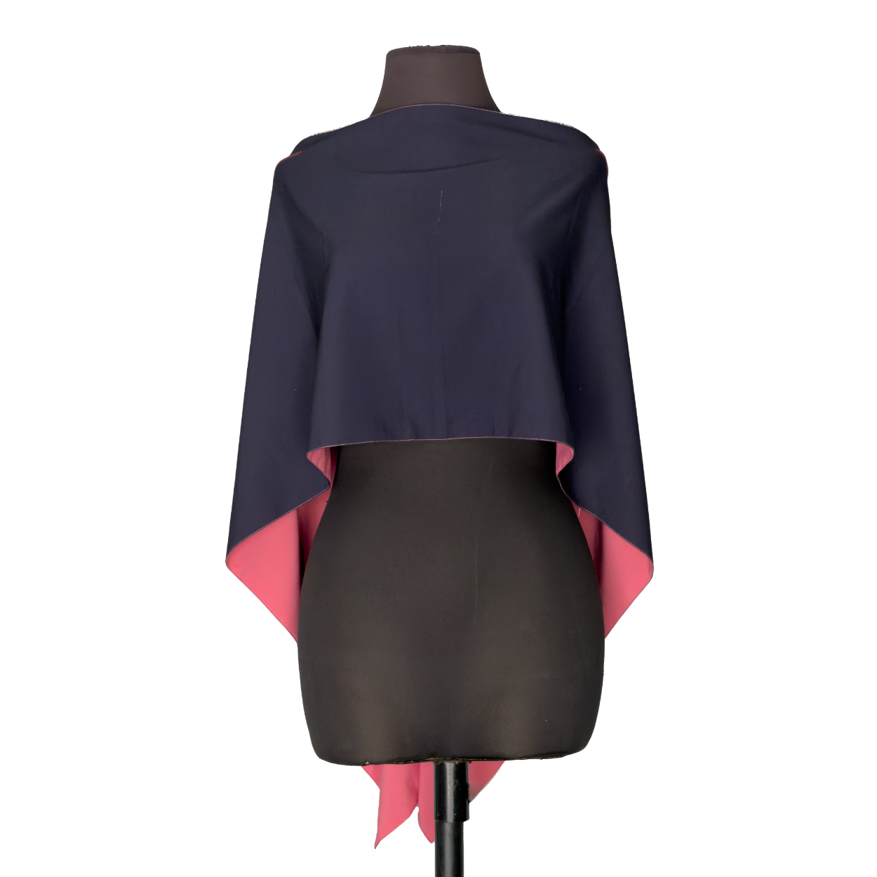 Navy blue cape with pink lining draped over a black dress form mannequin.