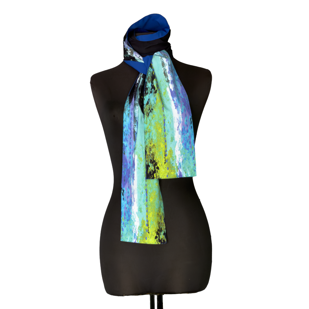 Black mannequin wearing a blue, green, and yellow patterned scarf draped around the neck