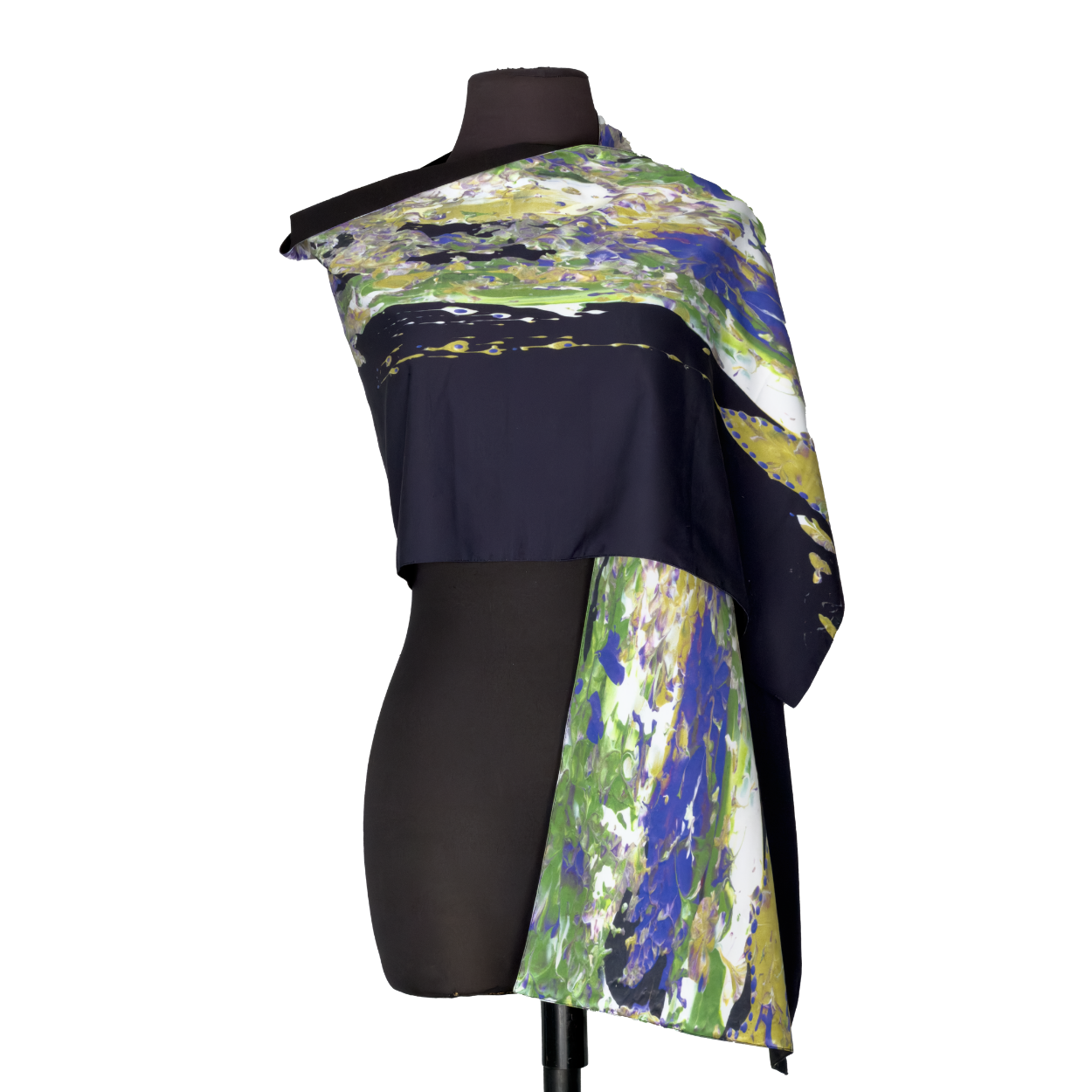 Mannequin wearing a navy, green, blue, and white asymmetrical wrap top and skirt set