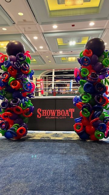 multicolor-balloon-swirl-columns-entrance-showboat-2024.jpg
