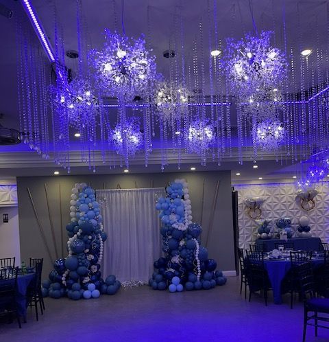 Balloon table displays created by My Life In Balloons LLC with large diamond ring foil balloons, pearlized orbs, and denim-toned accents. Ideal for bridal showers, birthdays, or engagement parties.