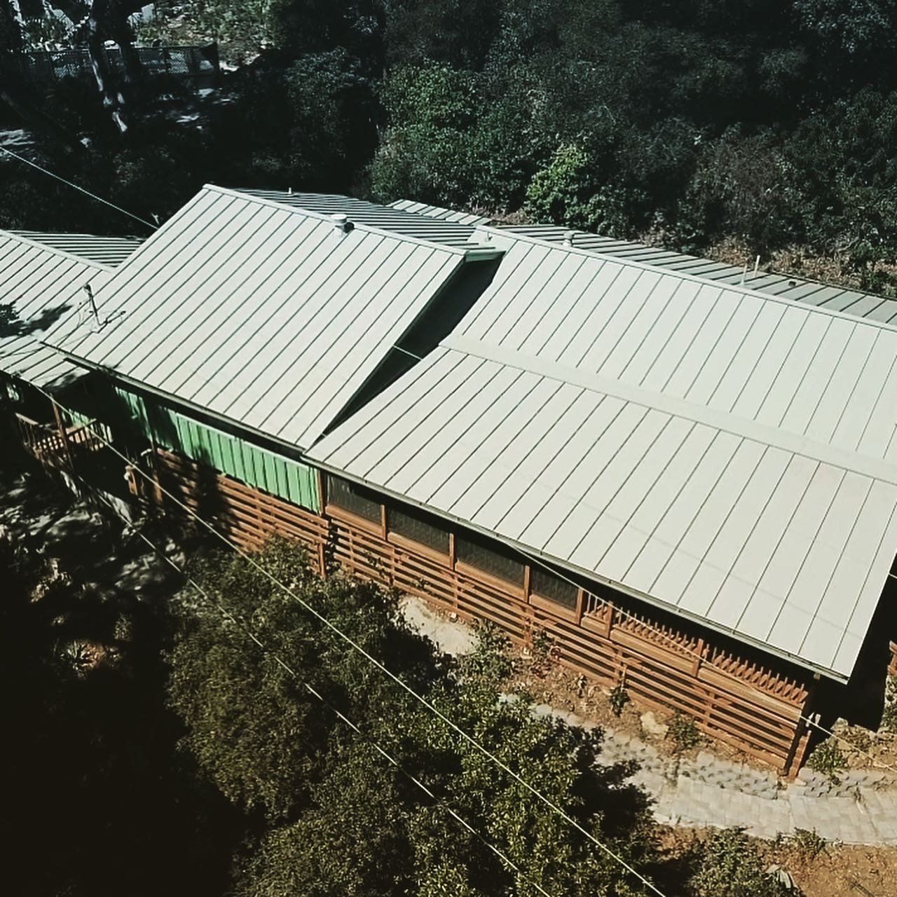 Top View Shot Of A House With Gray Metal Roof — Santa Barbara, CA — All About Metal Inc.