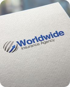 A close up of a worldwide insurance agency logo on a piece of paper.