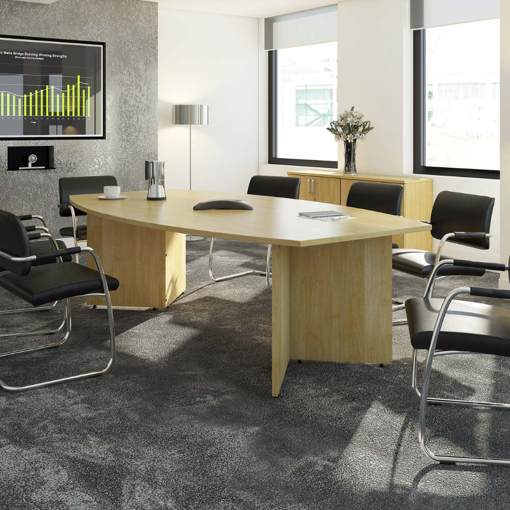 a conference room with a large table and chairs