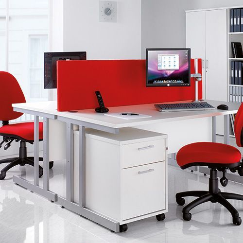a white desk with a red divider and a computer on it