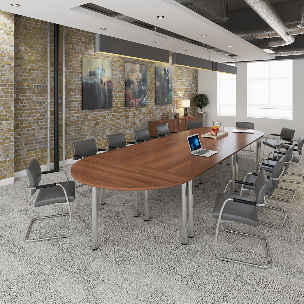 a conference room with a long table and chairs