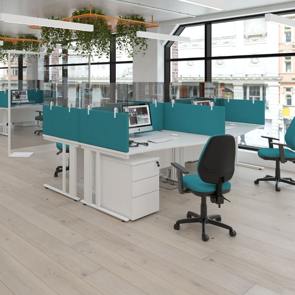a large office with a lot of desks and chairs