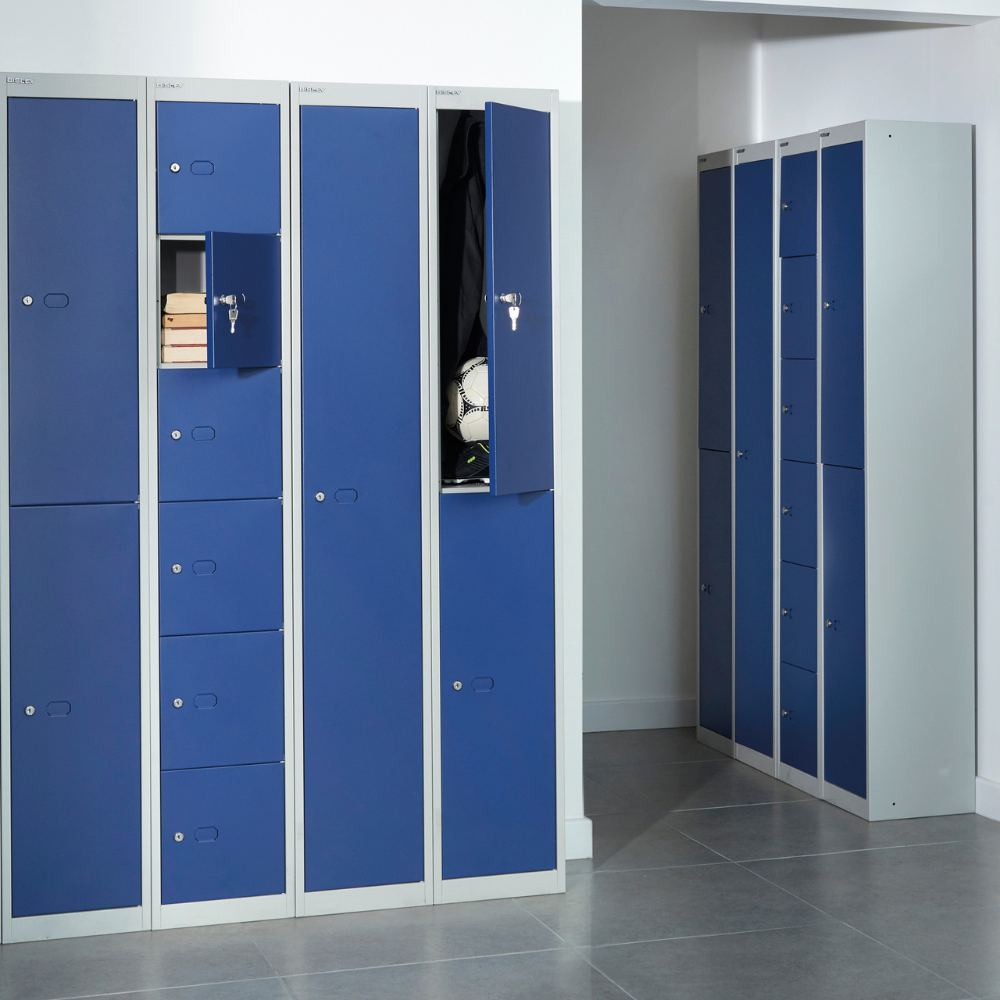 a row of blue lockers in a room with one open