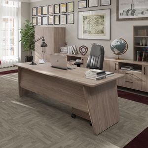a wooden desk with a laptop on top of it in a living room .