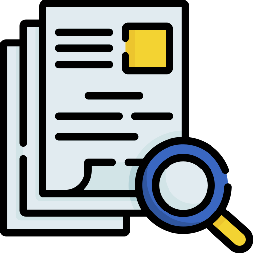A magnifying glass is looking at a stack of papers.
