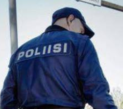 Back of a police officer in blue uniform with 