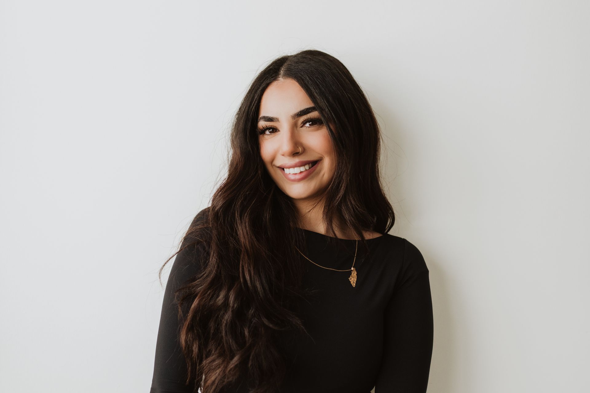 young woman laughing at camera