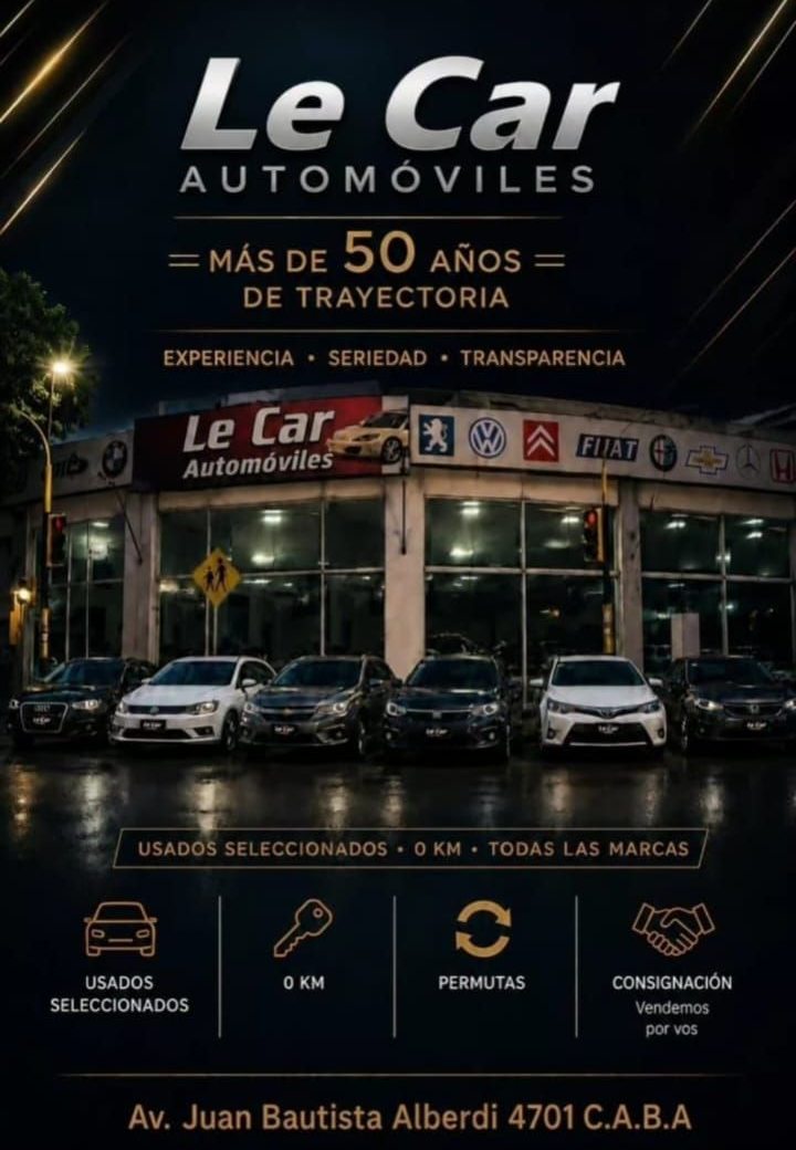 Escritorio de oficina con llaves de coche y documentos firmados junto a la ventana de una tienda.