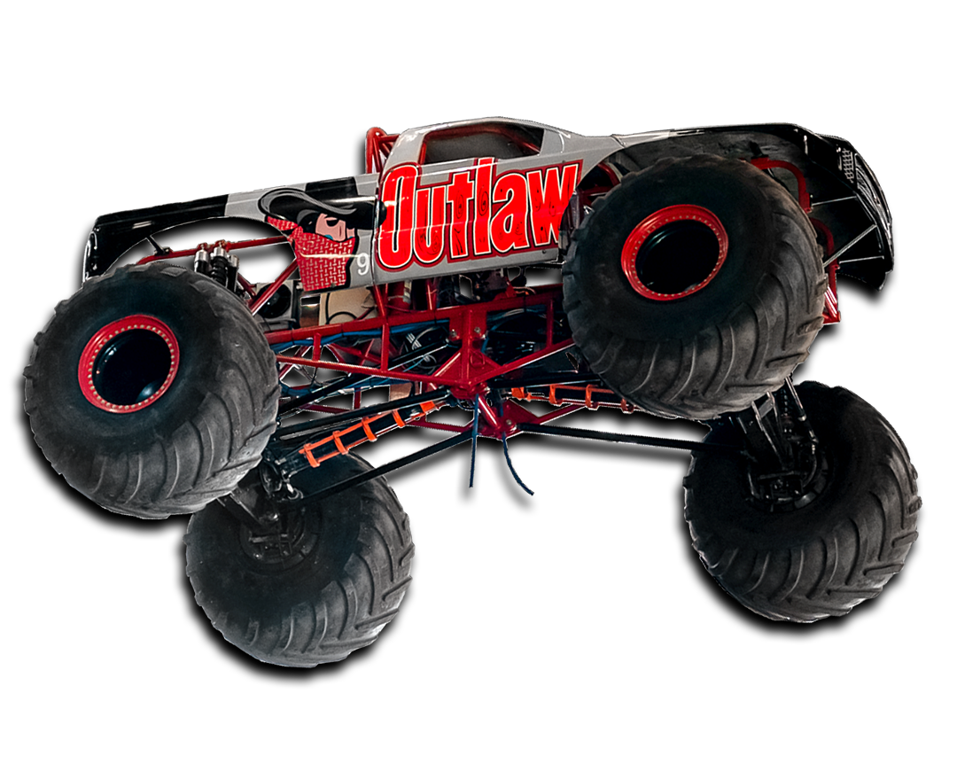 Outlaw monster truck with red and black accents, large tires.